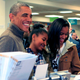 U.S. President Barack Obama and daughters Sasha (C) and Malia purchase books at Politics and Prose bookstore for ‘Small Business Saturday’ on November 29, 2014 in Washington, DC.